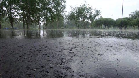 Heavy rain in the city park South Butovo
