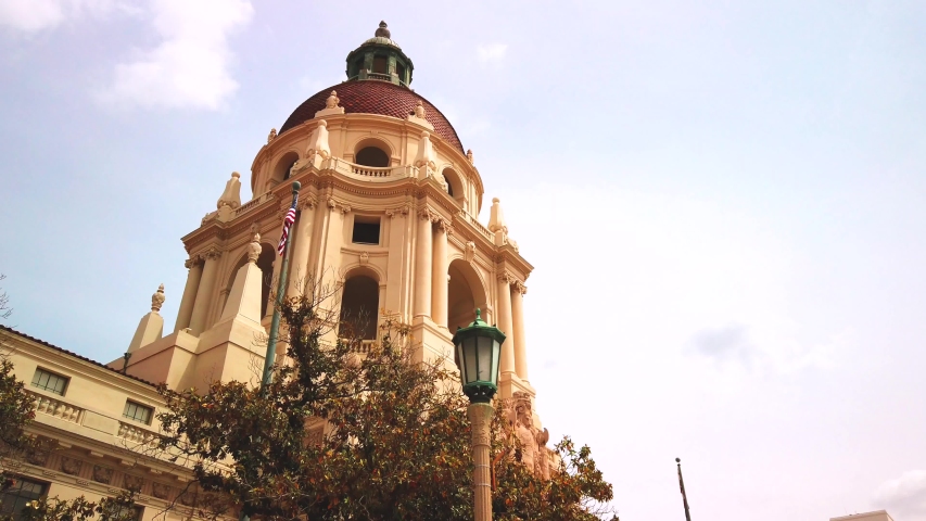 Panning around, front facing historic City Hall Government building, on a sunny day, in Pasadena, California