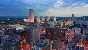 Drone footage of Albany, New York downtown at dusk, with rotating camera motion. Albany is the capital city of the U. S. state of New York and the county seat of Albany County