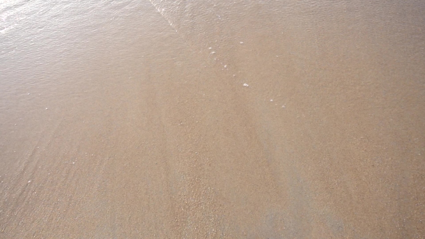 Slow motion of white sea waves on shore | Shutterstock HD Video #1030563356
