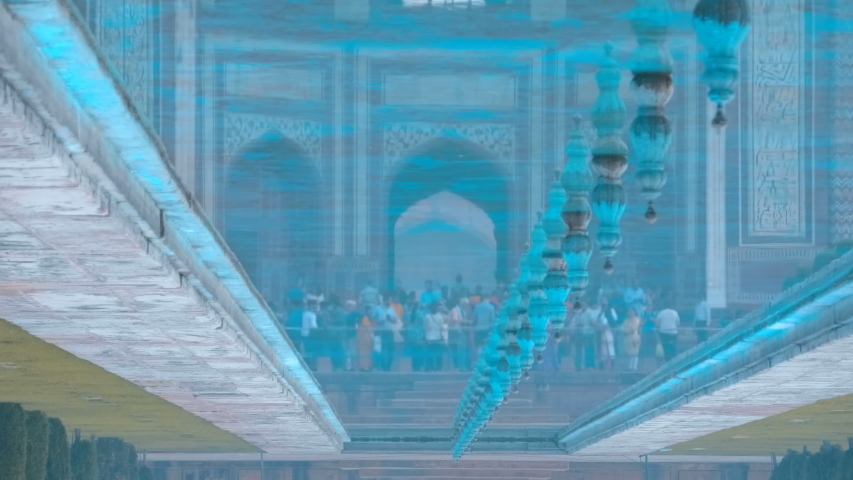 Taj Mahal - a mausoleum mosque, combines elements of Indian, Persian and Arab architectural styles, located in Agra, India, on the banks of the Yamuna River. Reflection from water surface