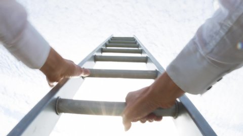 Personal perspective of a caucasian man climbing a ladder 
themes of challenge opportunity motivation win career
