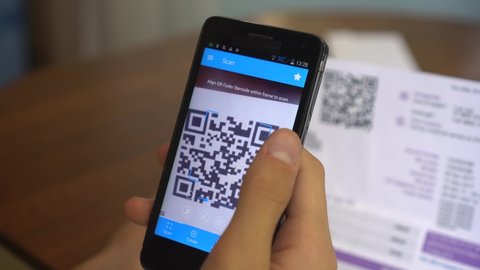 Payment of utility using QR code and mobile device. Real-time contact-free QR code payment. QR Code Scanner. Electricity and Gas Bill.Consumer pays on his smartphone 