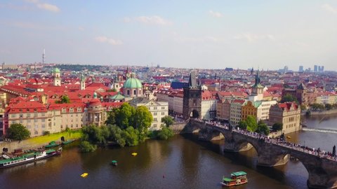 Aerial footage of Prague, Czech Republic, on a Beautiful summer’s day over the city, including Charles Bridge and Prague One municipal district.