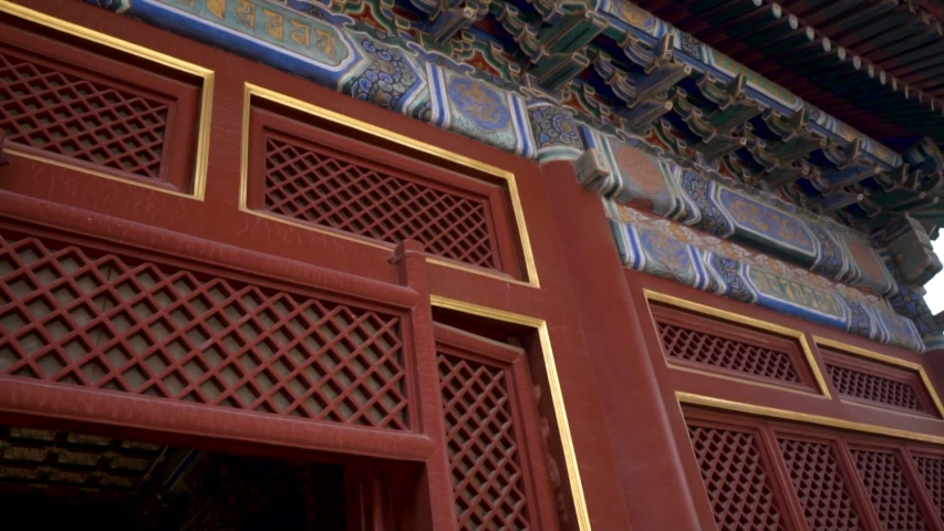 Details of wooden entrance at Lama Temple in Beijing China