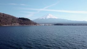 Aerial Reveal of Mt. Fuji and Bridge over Water
