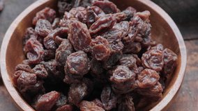 Close up footage of brown raisins. Selective focus. Tracking shots.