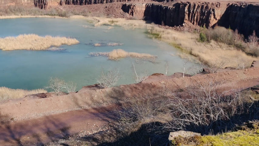 Top View Tilt Of Historical Scandinavian Limestone Query And Turquoise Pond