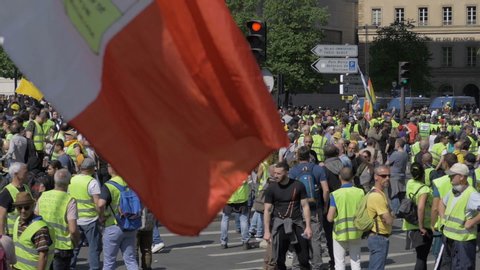 Paris,France,20 April 2019: Yellow vest people marching in the street of paris