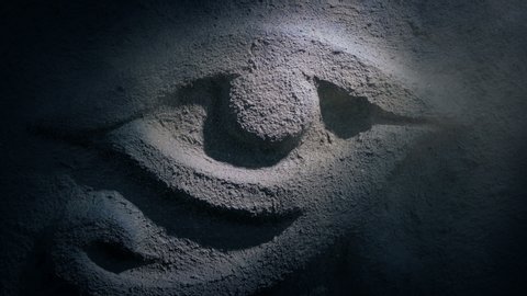 Torch Shines On Egyptian Eye Rock Carving