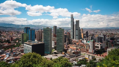 Bogota, Colombia, zoom in time lapse view of Bogota cityscape on a sunny day. Bogota is the sprawling capital of Colombia and one of the largest cities in South America.