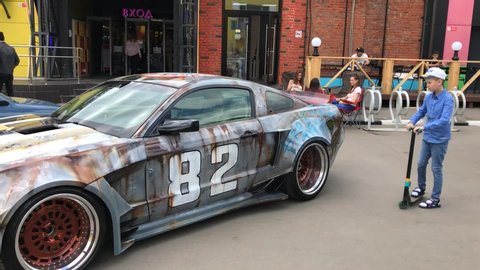 MOSCOW, RUSSIA - JUNE 1, 2019: Open automobile festival of Stance culture in Podsolnukhi Art and Food center, Moscow city, Russia. Unusual tuning Mustang car with cool wheels. Art car. Customized car
