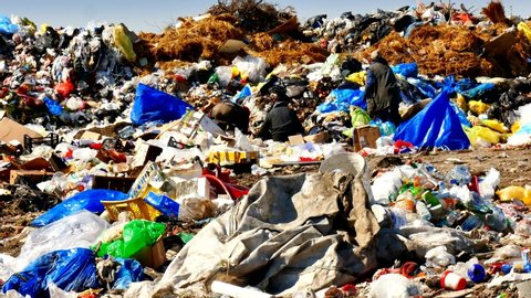 Zrenjanin, Serbia 16th April 2019: Plastic bottles, bags and other garbage at the city landfill, 4k Video Clip