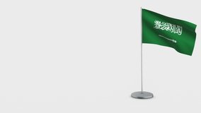 Saudi Arabia waving flag animation on Flagpole. Perfect for background with space on the left side.