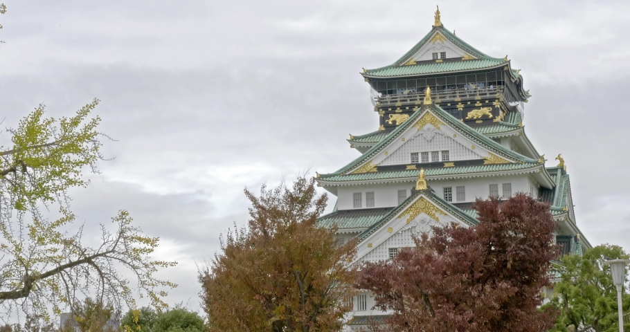 Osaka Castle Japan from 16th Century Landmark and Attraction View From Nishinomaru Garden With Trees and Skyline Panorama
