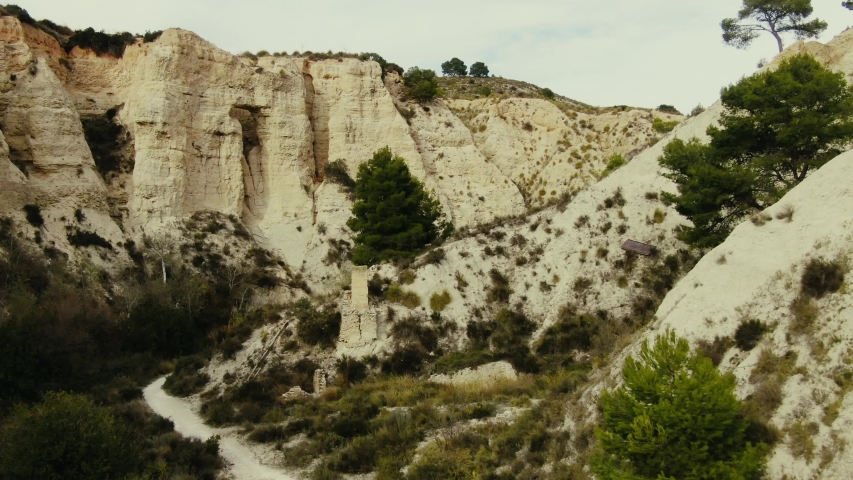 Aerial shot going out of a ravine in an arid area in the south of Spain.