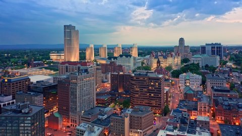 Drone footage of Albany, New York downtown at dusk, with uptilt camera motion. Albany is the capital city of the U. S. state of New York and the county seat of Albany County