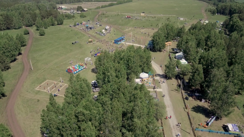 Folk festivals in Bashkiria - Sabantuy - the holiday of the plow. Aerial view.