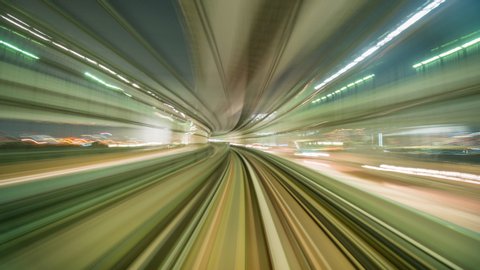 Time-lapse Light motion blur from Yurikamome Line moving inside tunnel in Tokyo, Japan.