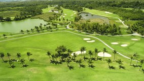 Aerial view of pond on golf course in tropical caribbean resort