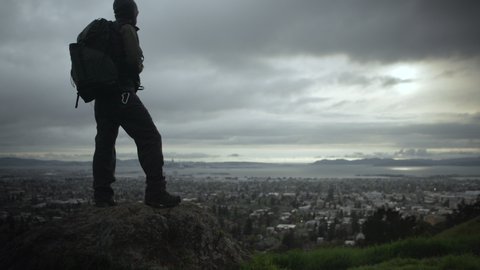 Professional photographer with a professional camera out in San Francisco taking pictures of the natural landscape. Shot on a Canon C200 in 4K in San Francisco in 2019.  Stock video