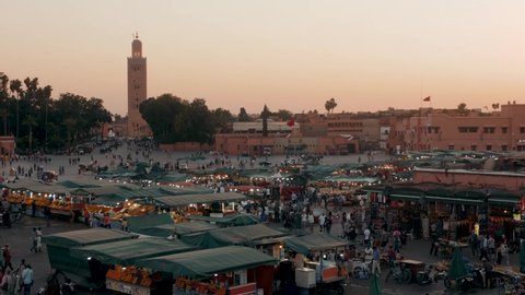 MARRAKECH, morocco 15 MAY 2019: Evening in Djemaa el Fnaa square in Marrakech. Evening in the messy Djemaa el Fnaa square in Marrakech, crowd people shopping ramadan kareem