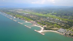 4K video resolution,Top view from Drone flight over sea beach and countryside at Southern Thailand