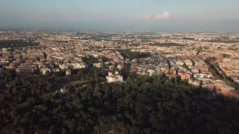 Drone, aereal view of Rome, villa borghese in the sunset