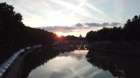 Drone, aereal view of Rome, Saint Peter, vatican, tevere river in the sunset