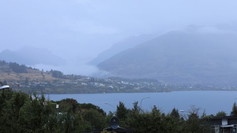 Timelapse Queenstown, New Zealand clouds on mountains 4K