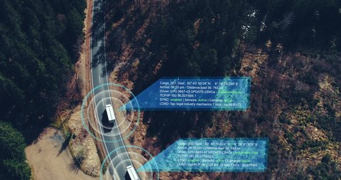 Autonomous Self Driving trucks driving on a forest highway with technology assistant tracking information, showing details. Visual effects clip
