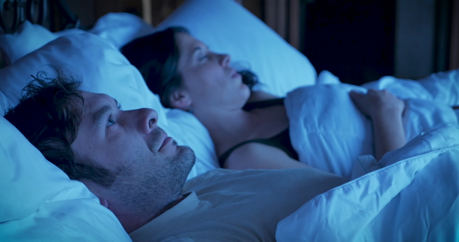 man-tossing-turning-bed-unable-sleep-stock-footage-video-100-royalty