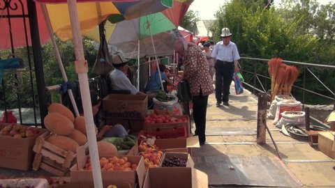 osh, Kyrgyzstan - 06 23 2018: june 24, 2018: Osh Bazar A Vendors at Osh Bazar. Dry Fruits and Spices