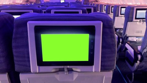 Green Screen Monitor in the Aircraft Cabin. Zoom In. You can Replace Green Screen with the Footage or Picture you Want with “Keying” Effect (check out tutorials on YouTube).