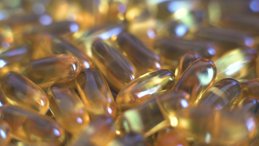 Omega 3 supplement vitamin gel capsules Royalty-Free Stock Footage #1030817498
