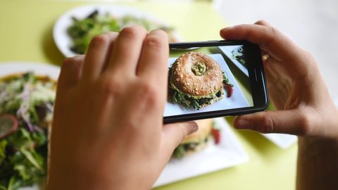 Hands Taking Photo Of Healthy Vegan Food With Smart Phone