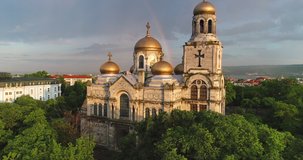 Aerial view of The Cathedral of the Assumption in Varna, Bulgaria. Beautiful rainbow over the city.