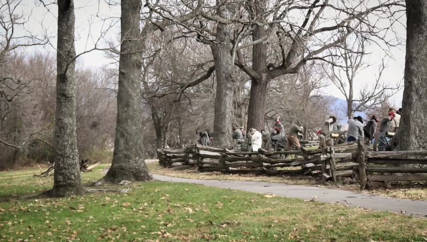 Slow motion video of Confederate artillery firing during a US Civil War reenactment. 