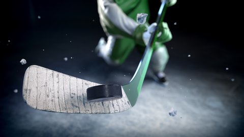 Hockey player in green uniform hits the puck in slow motion. Very  nice close-up (4k, 3840x2160, ultra high definition)
