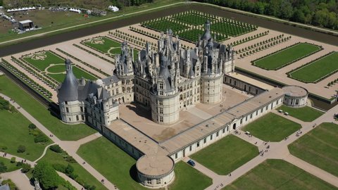 Aerial view of Chambord Castle (Chateau Chambord), picturesque castle in Loire Valley built in French Renaissance style, UNESCO world heritage site - landscape panorama of France from above, Europe