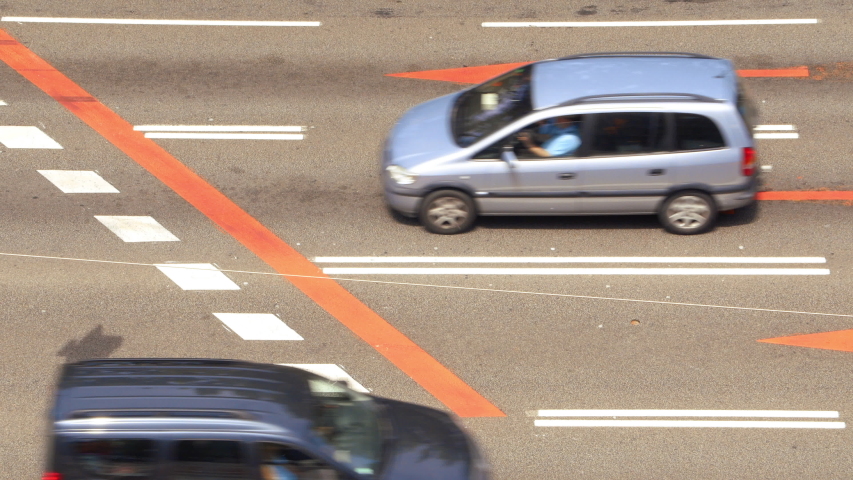Close-up of traffic in a wide avenue with several lanes / Heavy traffic concept