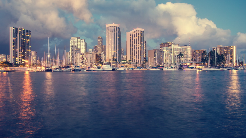 Time lapse of Hawaii downtown at twilight. Dramatic sky