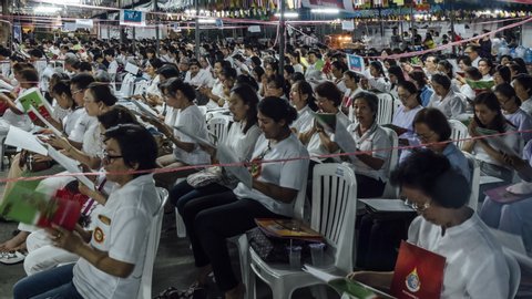 Bangkok, Thailand - 12 31 2018: Thai Buddhists pray at a New Year ceremony.