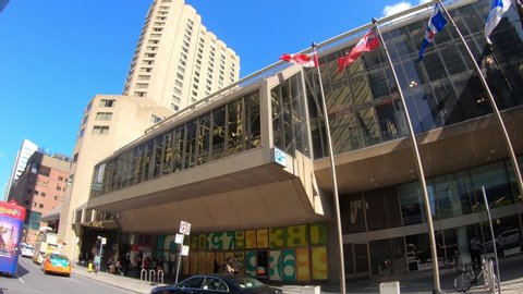 Toronto, Ontario, Canada May 2019 POV driving tilt up downtown Toronto business and financial district buildings