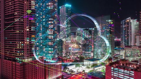 Futuristic city technology concept with Wireless network 5G icons, Futuristic Night City Hyperlapse data communication, big data using artificial intelligence. Aerial smart city. Financial District 