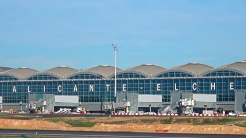 Alicante, Comunidad Valenciana / Spain - 11 20 2018: A Vueling aircraft landing at the Alicante-Elche airport, Spain. ALC