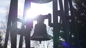 Church bells lens flare in 4k slow motion 60fps