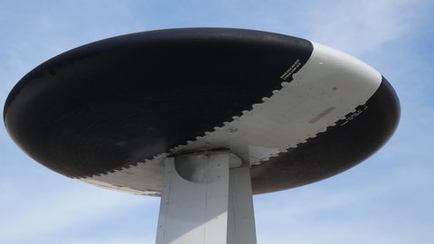 OKLAHOMA CITY, OKLAHOMA / USA - June 2, 2019: The radome of an E-3 Sentry AWACS spins while on static display at the Star Spangled Salute Air & Space Show at Tinker Air Force Base.
