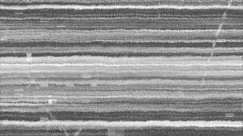 Digital animation of monochrome static lines moving in the screen