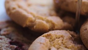 Close up footage of home made brown chocolate cookies.  Selective focus. Tilt up shot.